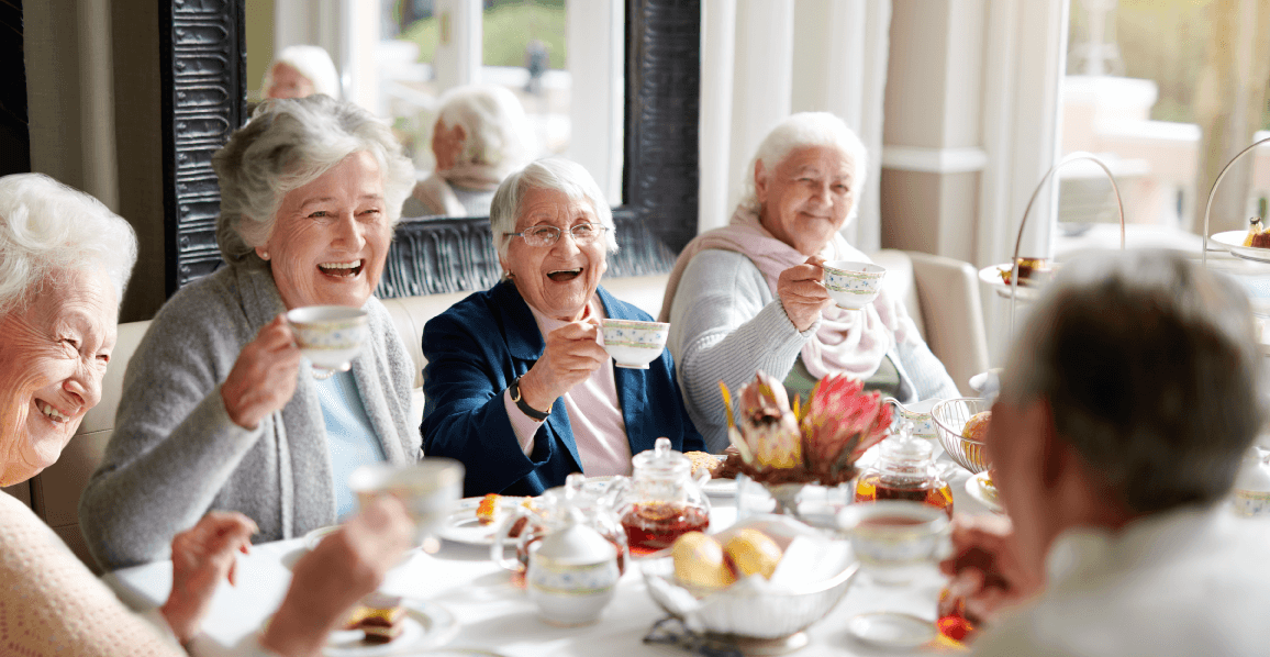 group of senior women enjoying tea