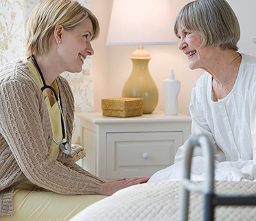 Senior lady with nurse