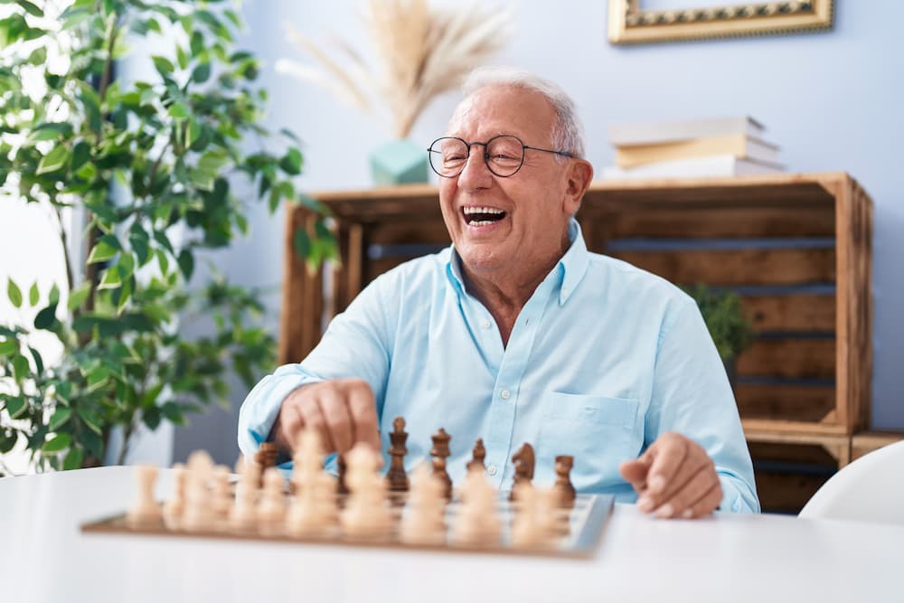 senior man enjoying a game of chess